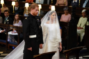 Royal wedding. Prince Harry and Meghan Markle in St George's Chapel at Windsor Castle for their wedding. Picture date: Saturday May 19, 2018. See PA story ROYAL Wedding. Photo credit should read: Dominic Lipinski/PA Wire URN:36583621